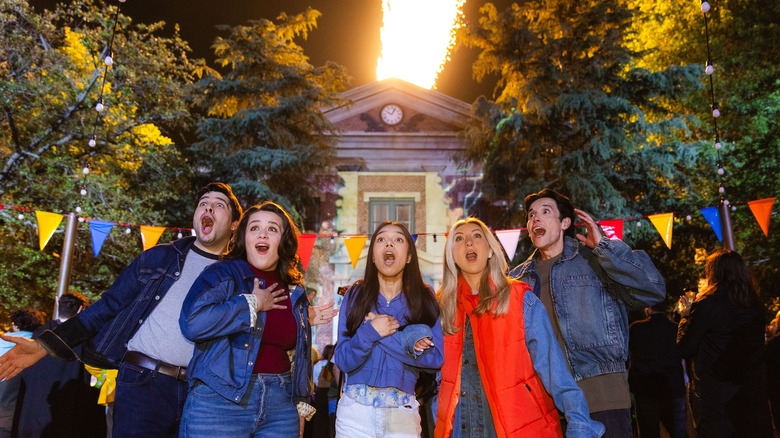 Fans watch the clocktower get hit by lightning at Universal Fan Fest Nights