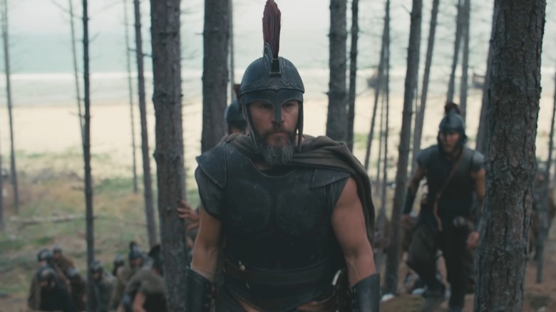 Matt Damon as Odysseus wandering through the trees in The Odyssey