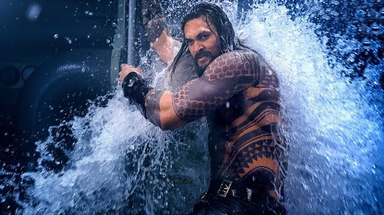 Aquaman getting hit by water