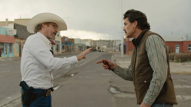 Mayor Ted Garcia points fingers at his rival Sheriff Joe Cross in the middle of the street in Eddington