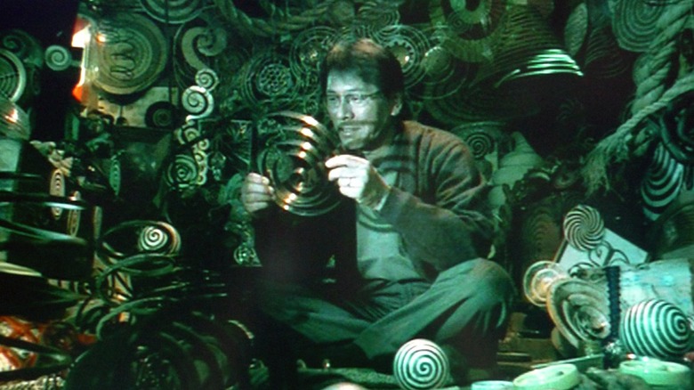 Shuichi's father develops an unhealthy spiral obsession in Spiral