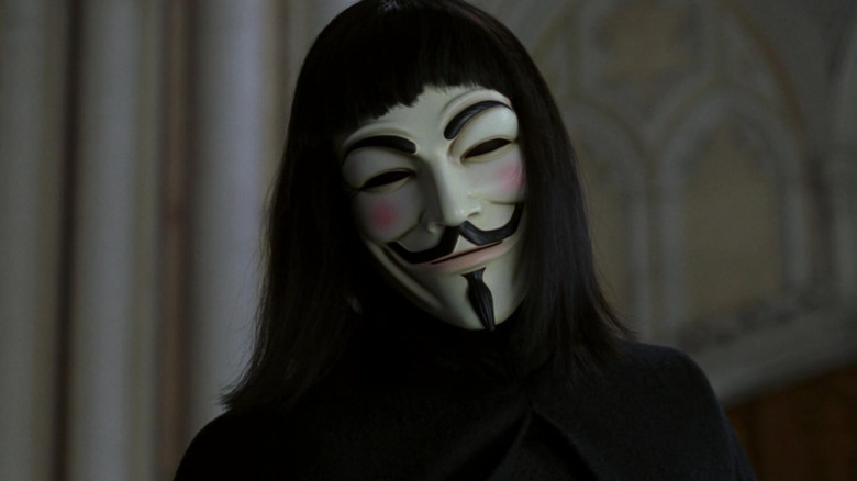 V cocking his head (with his mask on) in V for Vendetta