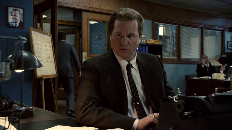 Detective Joe Manditski working at a police station in Kill The Irishman