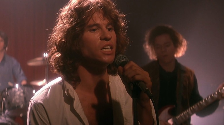 Val Kilmer sings in a trance state as Jim Morrison in The Doors