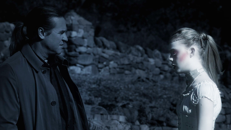 Val Kilmer's Hall Baltimore stands opposite Elle Fanning's V in Twixt