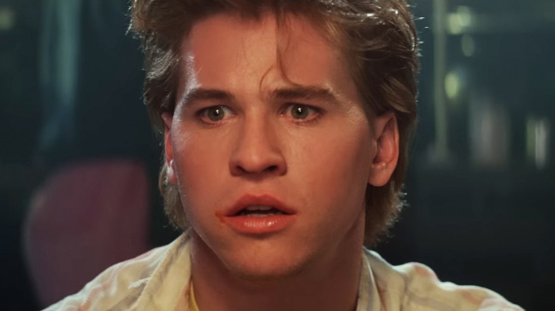 Val Kilmer's Chris Knight looks shocked in closeup in Real Genius