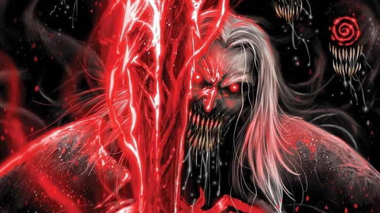 Knull holds All Black the Necrosword in front of his face