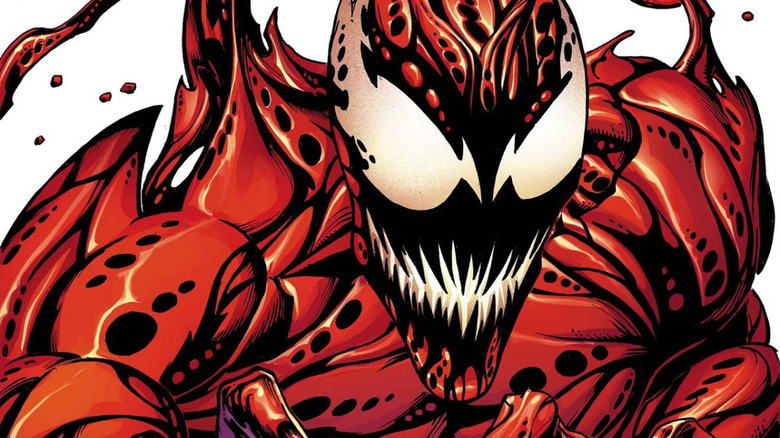 Carnage smiles with black teeth