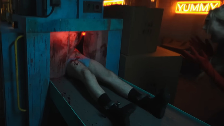Austin on the conveyor belt in the V/H/S/Halloween segment Fun Size