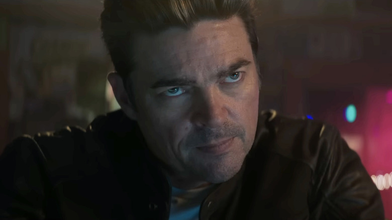 Karl Urban as Johnny Cage in a bar in Mortal Kombat II