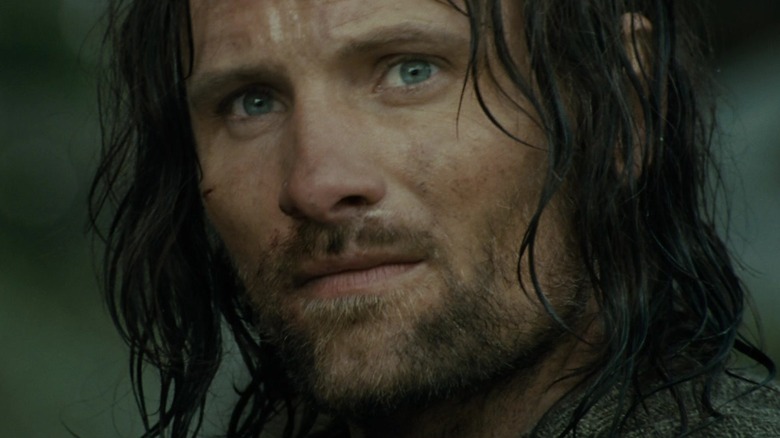 Viggo Mortensen as Aragorn looking sad in The Lord of the Rings: The Fellowship of the Ring