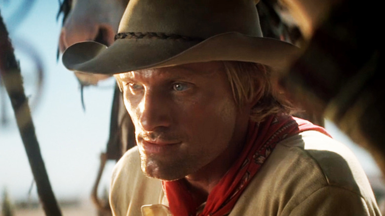 Viggo Mortensen's Frank Hopkins grits his teeth as he looks off into the distance in Hidalgo.jpg