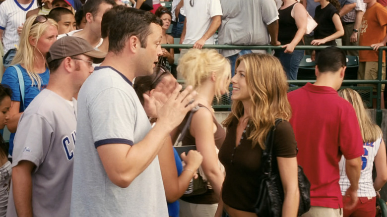 Vince Vaughn as Gary Grobowski talks to Jennifer Aniston as Brooke Meyers at a baseball game in The Break-Up
