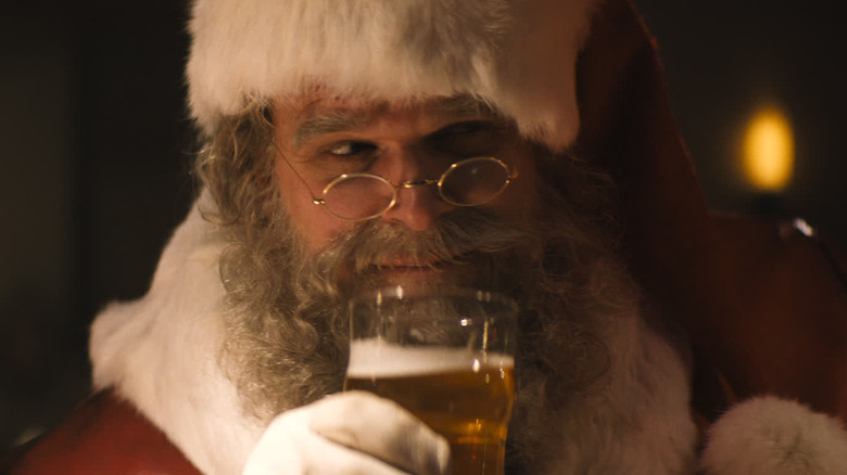 Violent Night santa has a beer