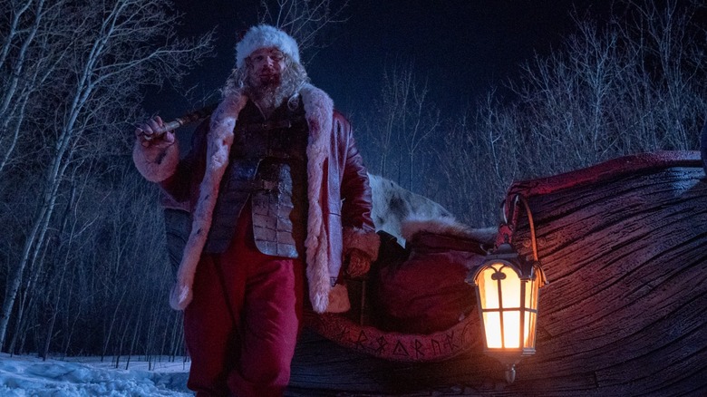 Violent Night santa bloody by sleigh