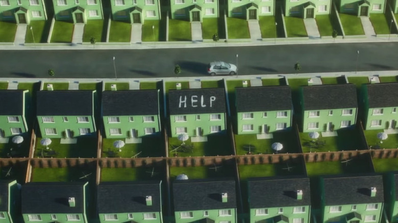 The word 'help' written on rooftop in Vivarium