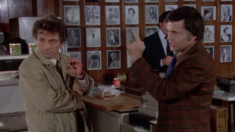 Walter Koenig as Morella talks through a crime scene with Peter Falk as Columbo