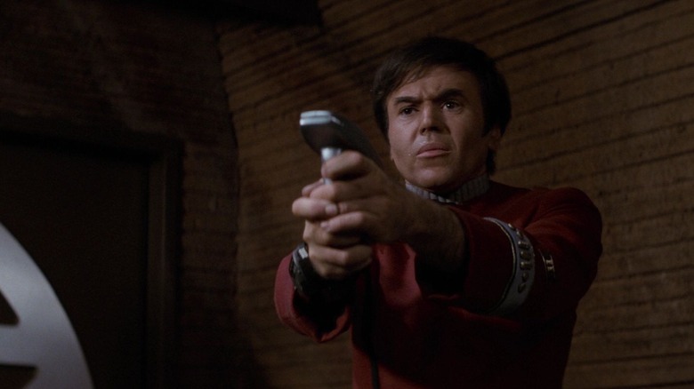 Chekov holding a phaser in Star Trek II: The Wrath of Khan