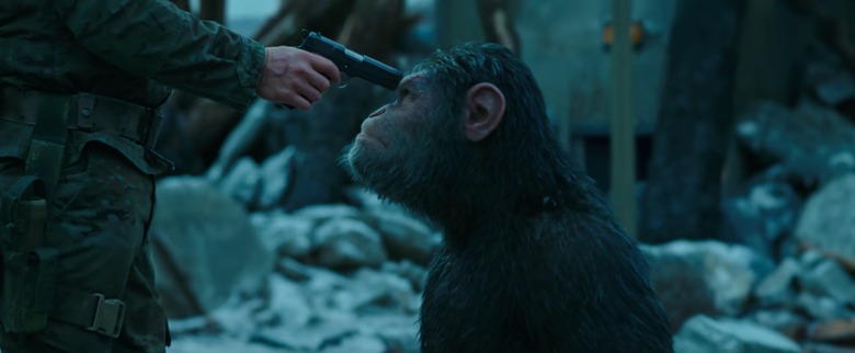 war for the planet of the apes ceasar and woody gun to the head