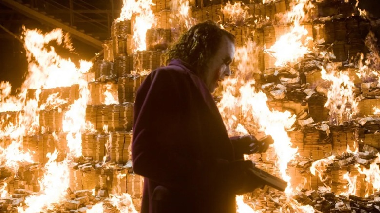 Dark Knight Joker burning money 