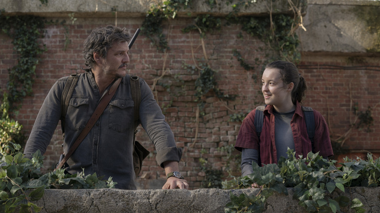 Joel and Ellie looking at each other in The Last of Us