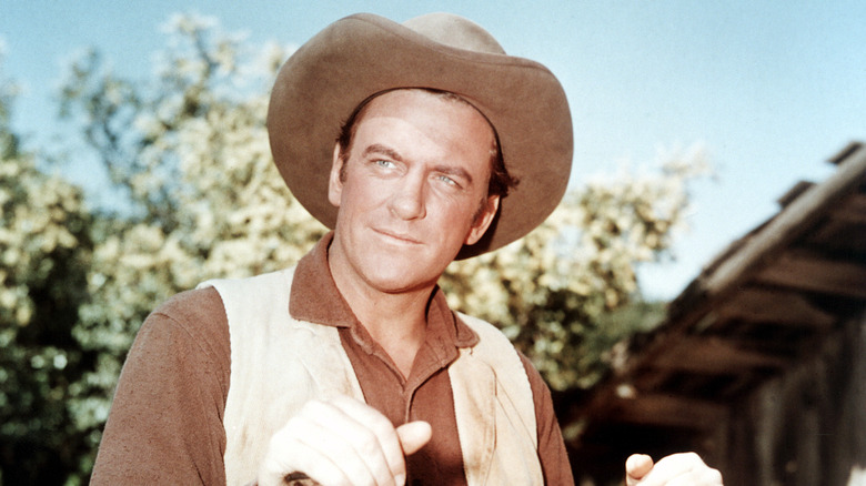 James Arness as U.S. Marshal Matt Dillon wearing a cowboy hat in Gunsmoke