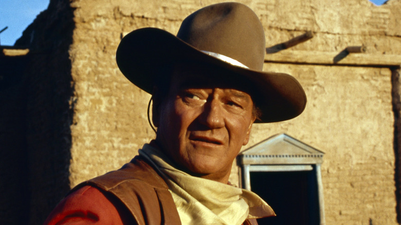 John Wayne as Cole Thornton wearing a hat in El Dorado