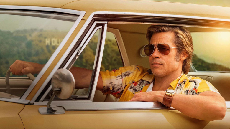 Cliff Booth driving his car.