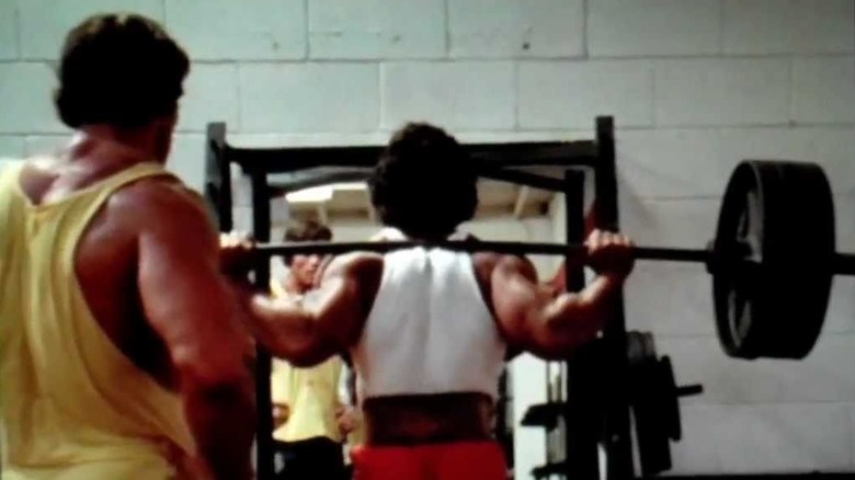 Ed Corney squatting in "Pumping Iron."