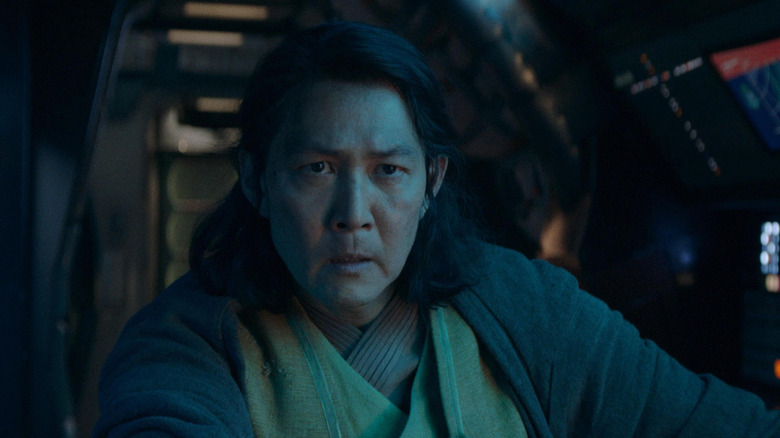 Lee Yong Jay in the role of Master Sol in the cockpit in his ship in the Star War: The Akolit