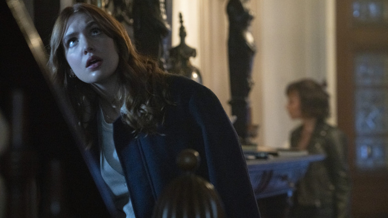 Sophie Nelisse as Ellie looking up the stairs in Whistle