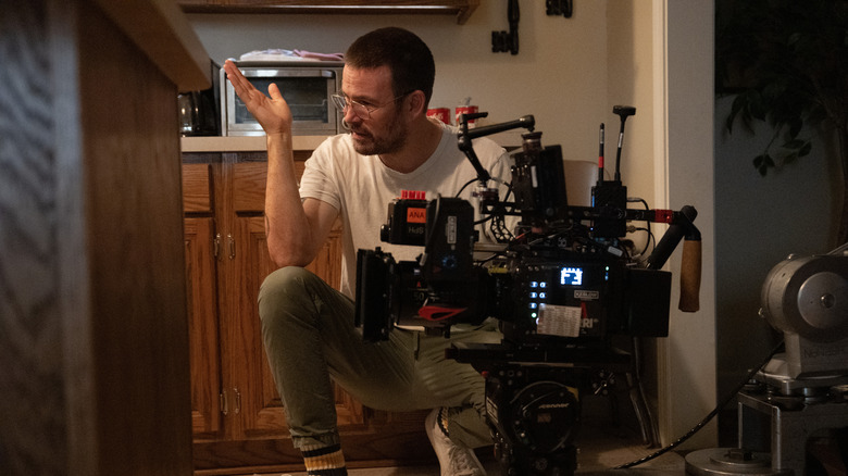 Zach Cregger with a camera on the set of Weapons