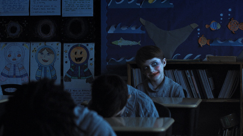 Alex Lilly wearing creepy makeup in Weapons