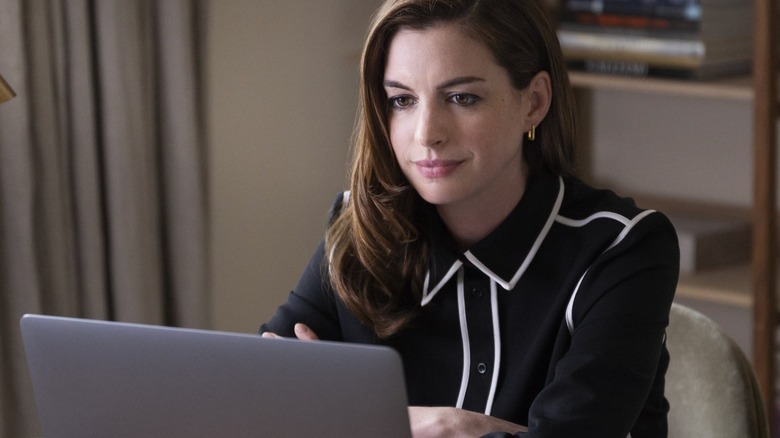 Anne Hathaway at computer
