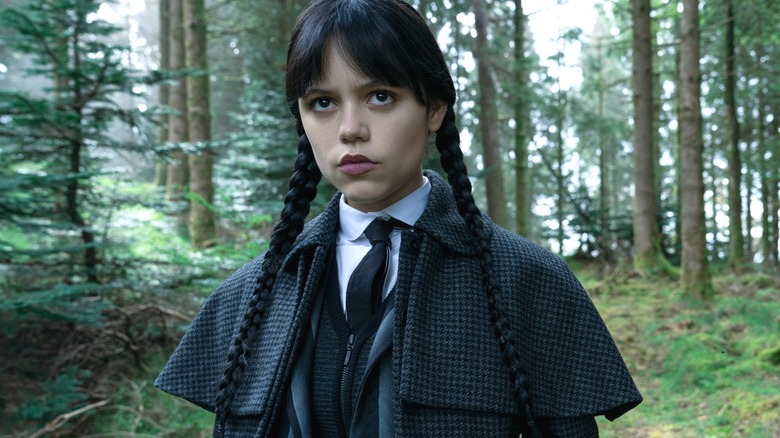 Wednesday spends her time investigating the woods in season 2 of Wednesday
