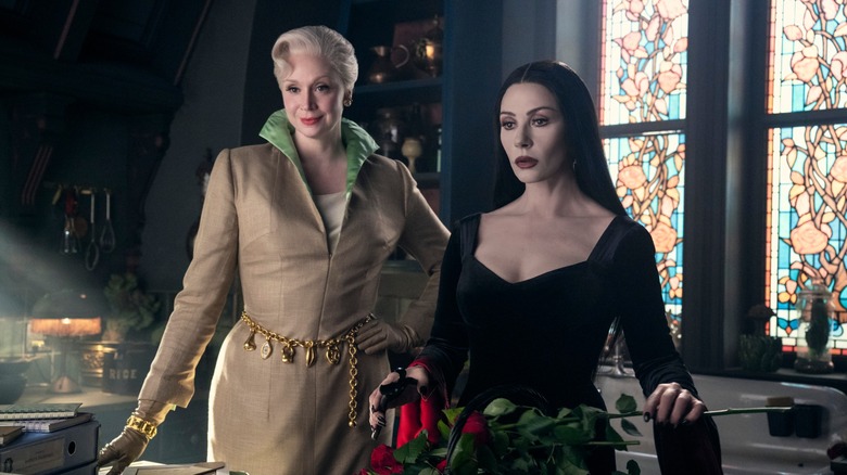 Morticia and Weems discuss Addams family secrets in Wednesday