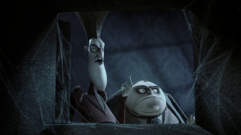 The Everglots inspecting a cobwebbed passageway in Corpse Bride