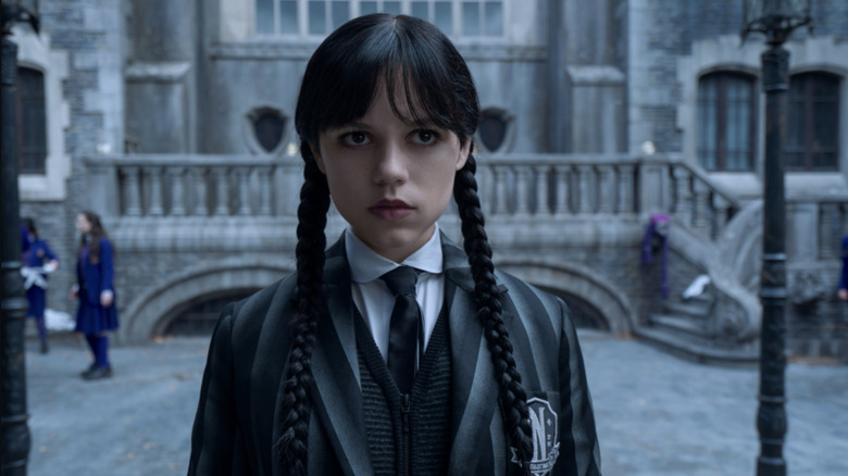 Wednesday Addams thinks hard about the mystery in Wednesday