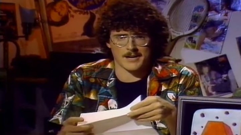 "Weird Al" Yankovic reading the news for an episode of Al TV