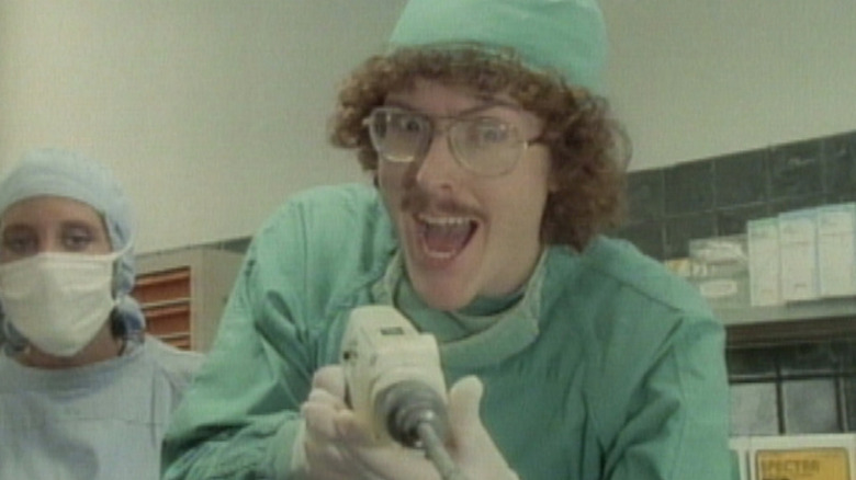 Still from Like a Surgeon music video
