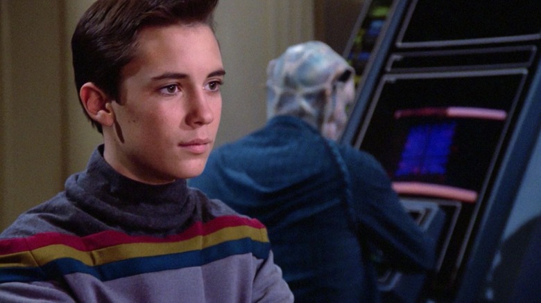 Wesley at a computer monitor taking a test on Star Trek: The Next Generation