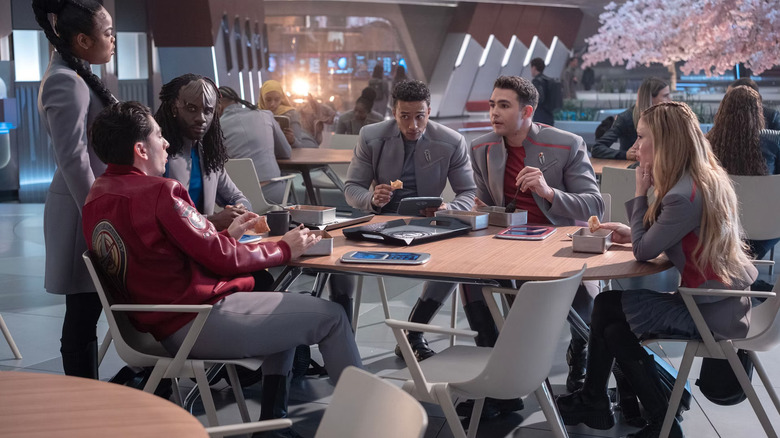 A group of cadets around a table on Star Trek: Starfleet Academy