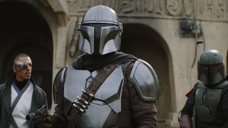 Jordan Bolger, Pedro Pascal, and Temuera Morrison in The Book of Boba Fett