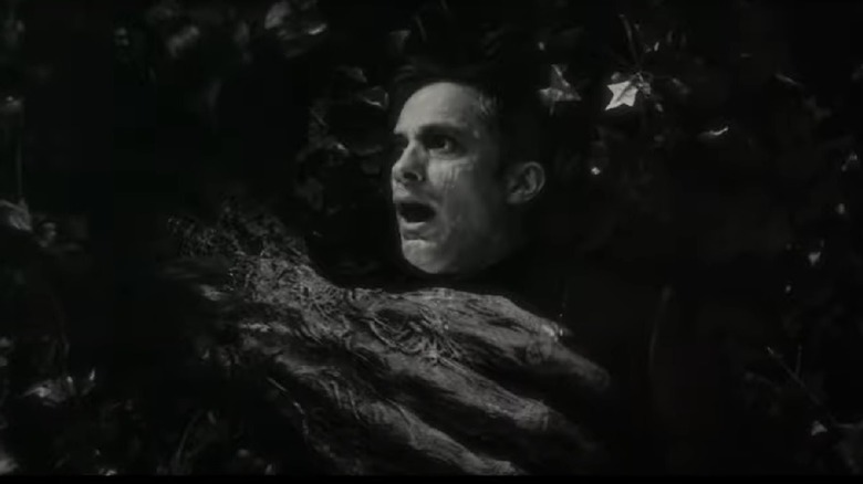 Werewolf By Night Man-Thing grabs Russell
