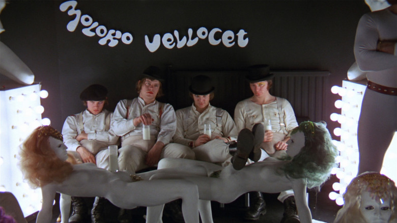 Malcolm McDowell and his droogs sit in the milk bar in A Clockwork Orange