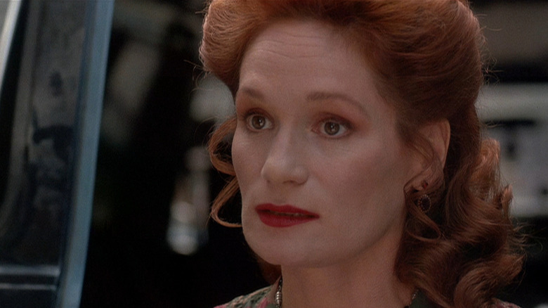 Ms. Robeson staring at someone in The People Under the Stairs