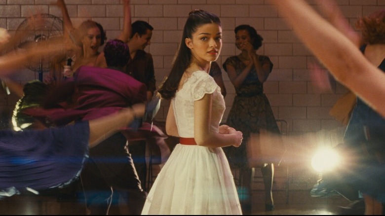 Girl white dress turns around