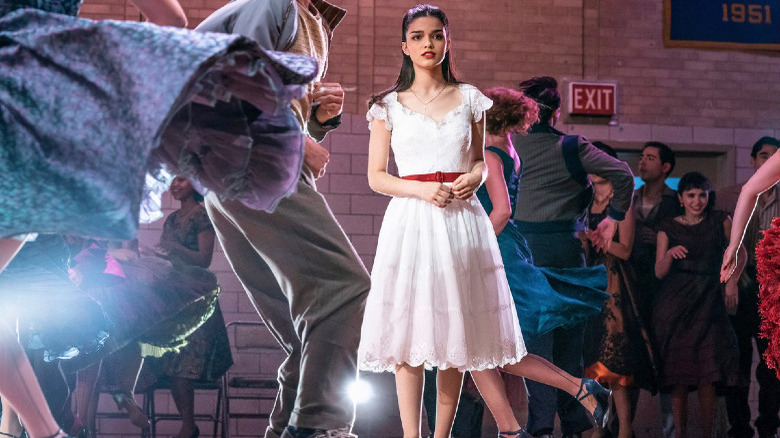Maria staring across the gymnasium in West Side Story