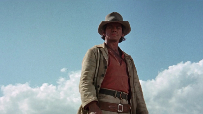 Harmonica looks down on his enemies in Once Upon a Time in the West