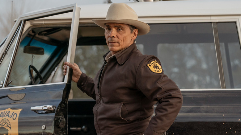Zahn McClarnon as Joe Leaphorn exiting his truck in Dark Winds